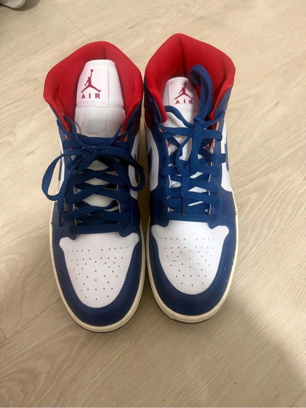 Jordan 1 Mid 'Patriots' sneakers in blue, white, and red
